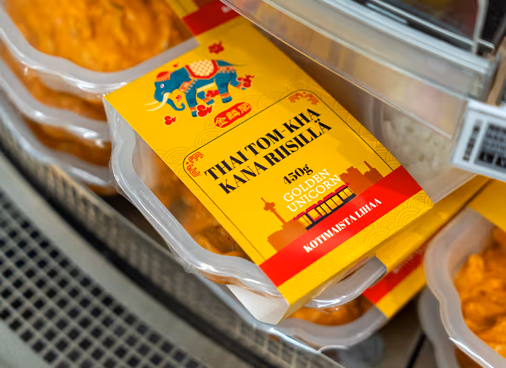 Golden Unicorn Thai Tom Kha chicken meal in yellow packaging.