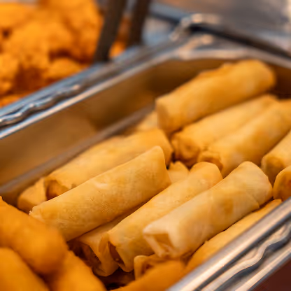 Tray of golden spring rolls.
