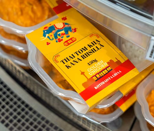 Golden Unicorn Thai Tom Kha chicken meal in yellow packaging.